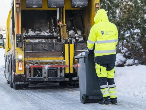 sorphirðubíll og starfsmaður