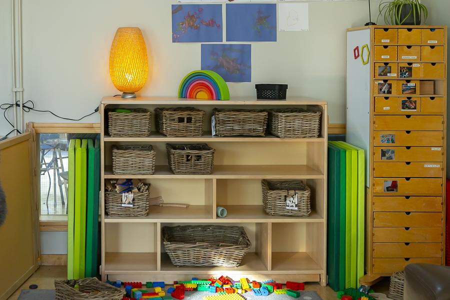 Shelf with toys in the Litir building, part of Rauðhóll Preschool