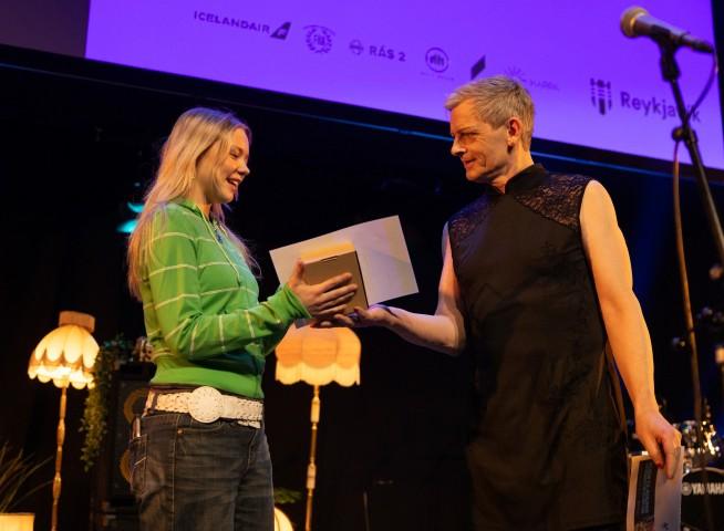 Third-place winner Lára accepts her award.