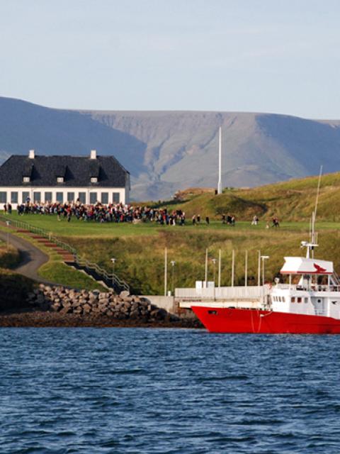 The harbor in Viðey with Viðey House in the background