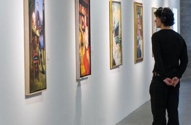 Image from an art museum — a person viewing a painting